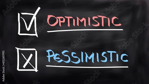 Optimistic pessimistic concept handwritten on blackboard