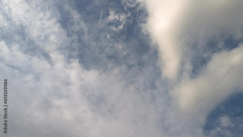 White clouds move in the afternoon White clouds move in the afternoon