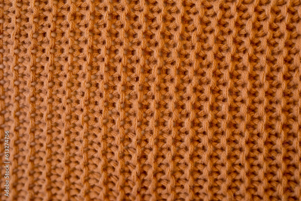 Closeup od brown knitted material - obrazy, fototapety, plakaty 