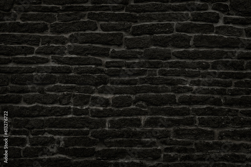old dark stone wall as vintage background