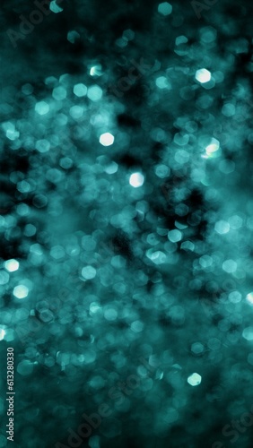 Vertical Full frame defocused and Bokeh snow and diamond tinsel glow. Festive turquoise and blue gala glitter abstract bokeh background for hydrogen power, luxury success and renewable energy concepts