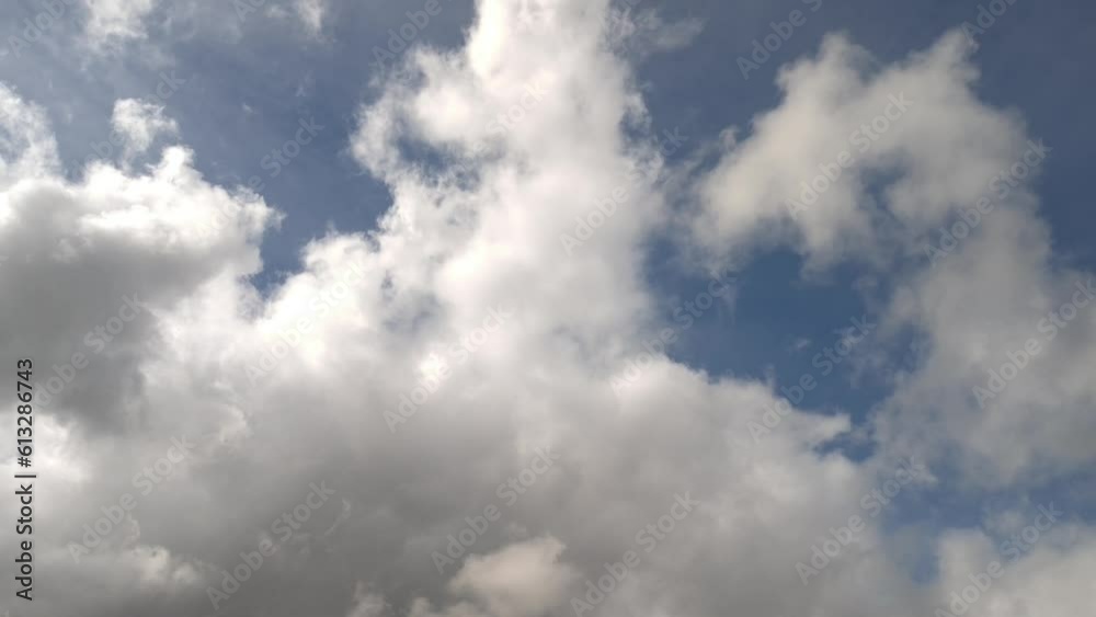 Giant wave of whitish and grayish clouds moving across the sky Giant wave of whitish and grayish clouds moving across the sky