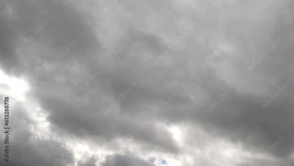 The clouds transform into a huge dark gray cloud The clouds transform into a huge dark gray cloud