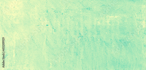Yellow speckled hand-painted illustration texture design of old distressed vintage grunge concrete with green stains. damaged textured abstract washed cement backdrop as web banner background.