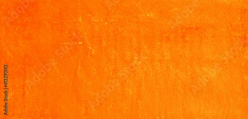 orange washed hand-painted illustration texture design of old distressed vintage grunge concrete with yellow stains. damaged textured abstract speckled cement backdrop as web banner background.
