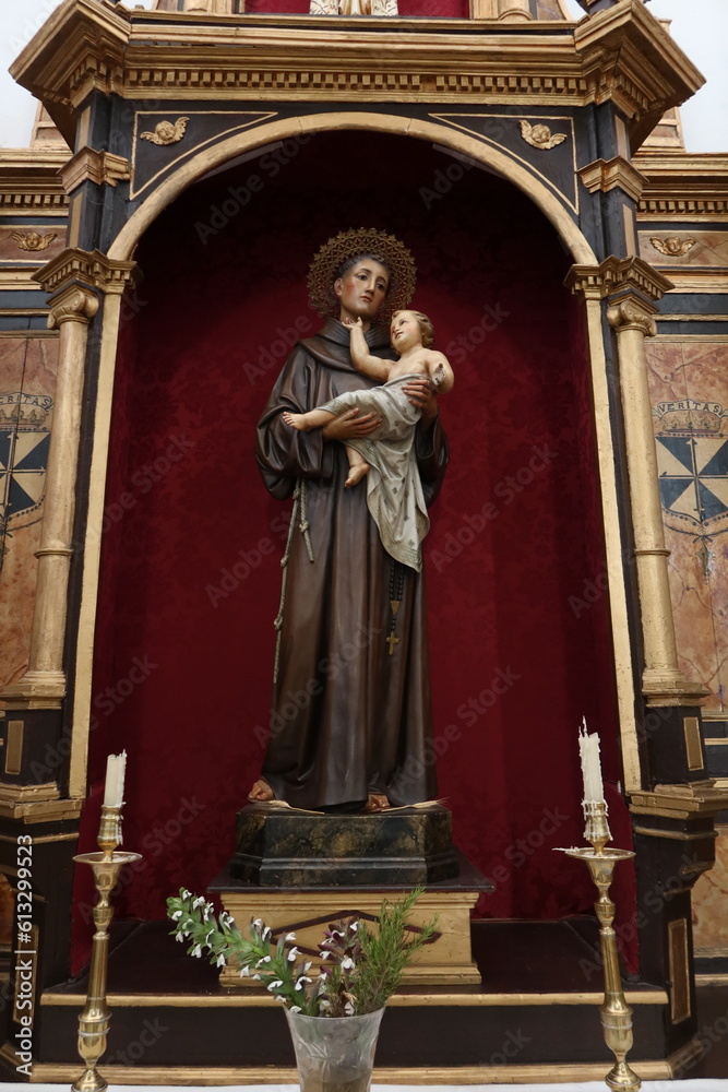 Aracena, Huelva, Spain, June 12, 2023: Saint Anthony with the baby Jesus in the Church of Nuestra Señora del Carmen. Building of the 16th, 17th century. Aracena, Huelva, Spain