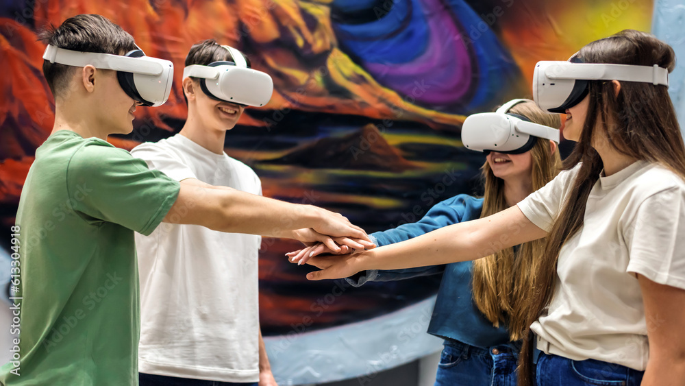 A team of friends playing with VR equipment