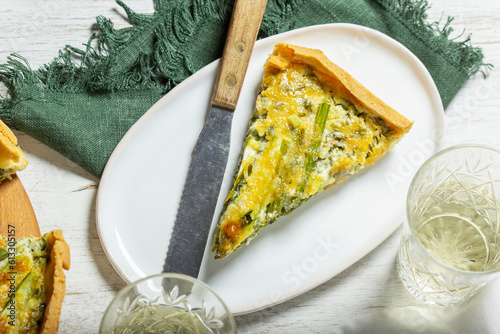 Obraz na płótnie Tart stuffed with asparagus, spinach, chard, cream and cheese, served with white wine. w salonie