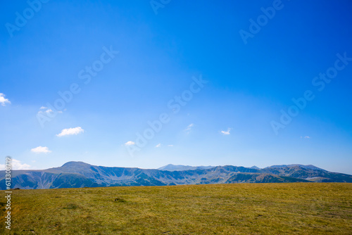 mountain landscape with empty space on clear blue sky