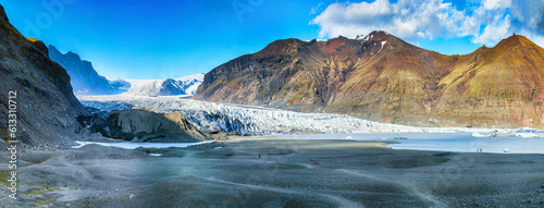 Breathtaking view of Skaftafellsjokull glacier tongue and volcanic mountains around on South Iceland.