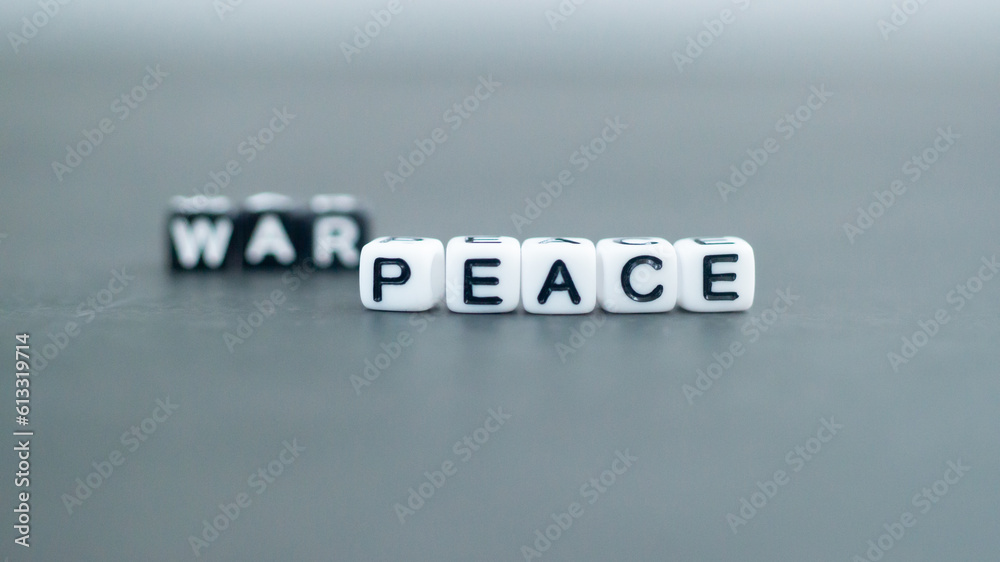 War Peace words in bead block letters. War and peace concept War Peace words in bead block letters. War and peace concept