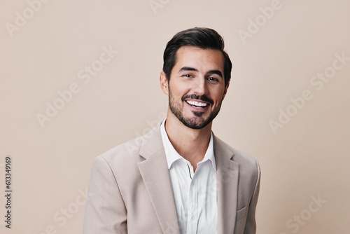 business man businessman beige happy smiling suit handsome portrait copyspace success