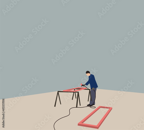 Man painting the surface of the wooden frame with a spray gun. Wooden furniture production. Handmade concept