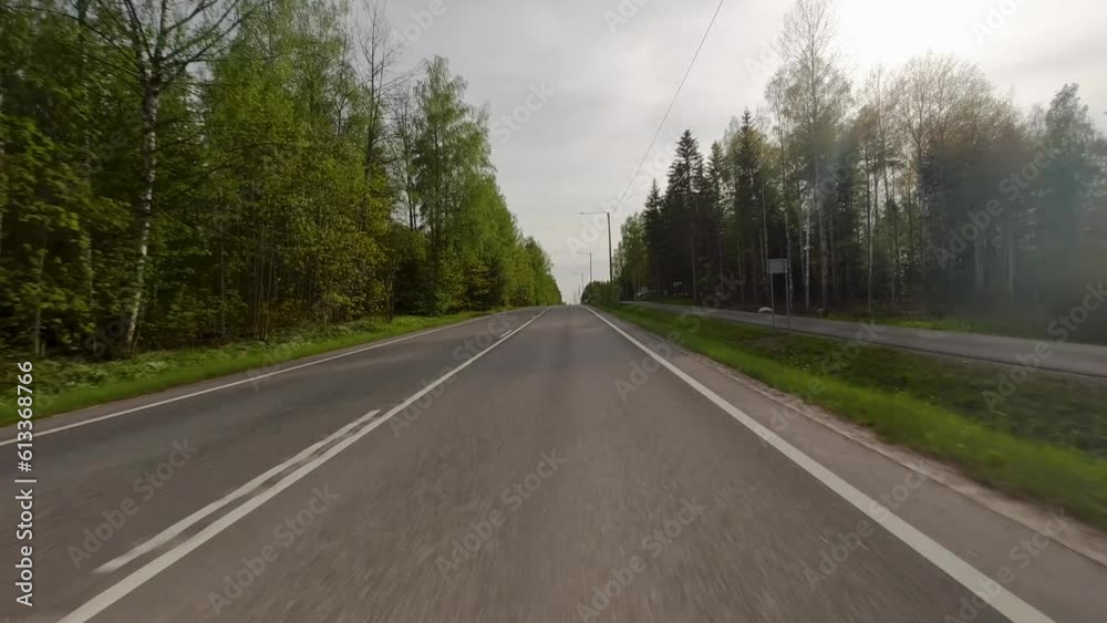 The road is adorned with lush green trees as it winds its way towards the village. The verdant canopy created by the trees provides a refreshing and serene atmosphere. The road is adorned with lush green trees as it winds its way towards the village. The verdant canopy created by the trees provides a refreshing and serene atmosphere.