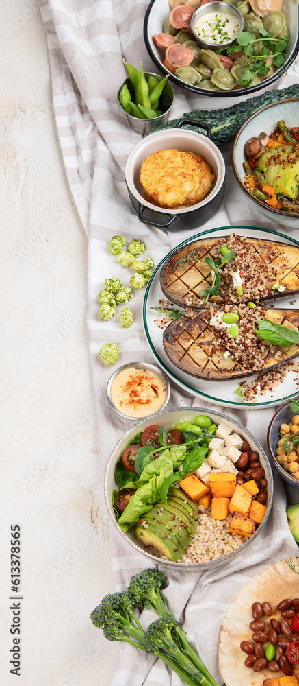 Vegetarian and various vegan dishes on light table. Healthy food concept with vitamins, fiber and antioxidants. Vegetarian and various vegan dishes on light table. Healthy food concept with vitamins, fiber and antioxidants.