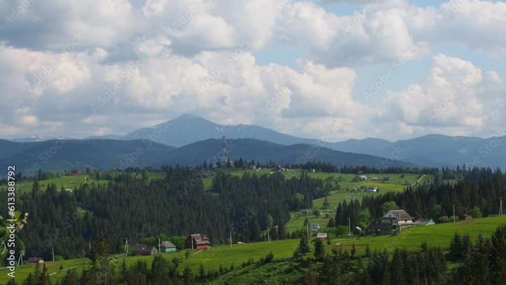 Carpathian landscape with cloudy sky. Green meadows in mountains near forest. Lifestyle in the Carpathian region. Ecology protection concept. Explore the beauty of the world. Carpathian landscape with cloudy sky. Green meadows in mountains near forest. Lifestyle in the Carpathian region. Ecology protection concept. Explore the beauty of the world.