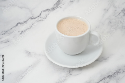 Hot milk tea in cup