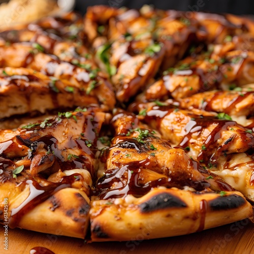 Pizza with chicken wings on a wooden board. Close-up.