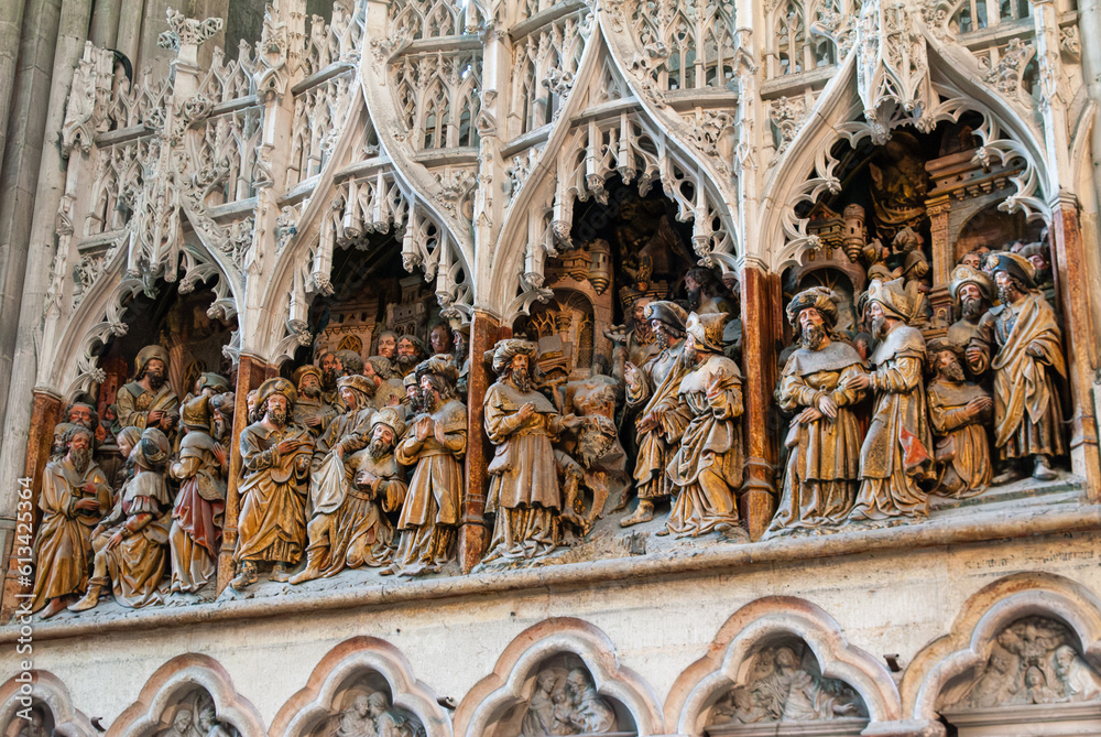 Fototapeta premium Christian stone carved choir scenes in the cathedral of Amiens