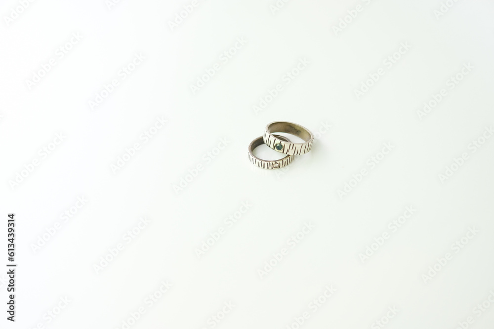 two rustic silver wedding rings isolated on white, wedding rings background concept