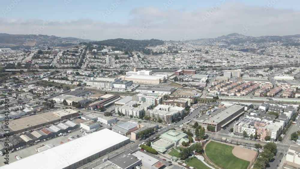 This drone footage captures a serene flyby over the Bayview neighborhood in San Francisco. The flight path is parallel to the 280 Highway