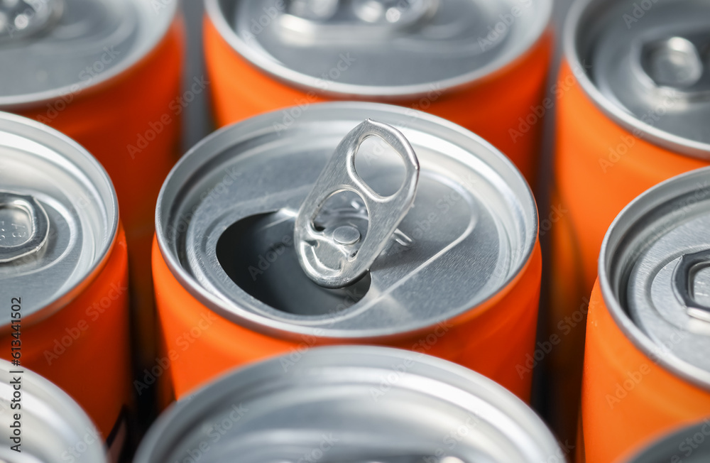Aluminum cans top view, closeup opened can ring from sweet so da drink can orange flavor, natural light. Aluminum cans top view, closeup opened can ring from sweet so da drink can orange flavor, natural light.