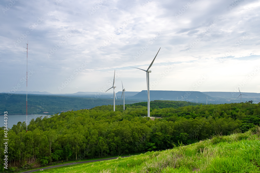 Huge fields of wind turbines used to generate electricity are located in the mountains where the wind blows constantly. Huge fields of wind turbines used to generate electricity are located in the mountains where the wind blows constantly.
