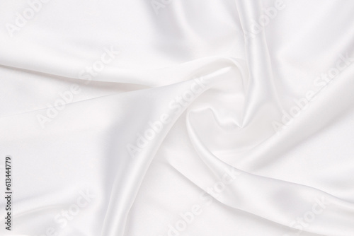 Elegance white satin silk with waves, abstract background luxury cloth, elegant wallpaper design.
