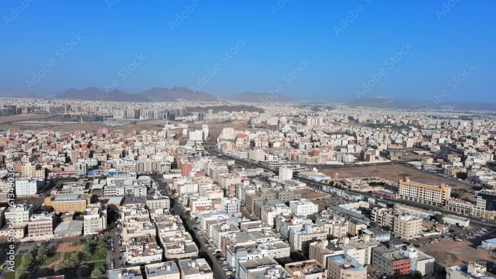 Medina, Saudi Arabia: Aerial view of famous city in Arabia, buildings in Arabic style - landscape panorama of Arabian Peninsula from above Medina, Saudi Arabia: Aerial view of famous city in Arabia, buildings in Arabic style - landscape panorama of Arabian Peninsula from above