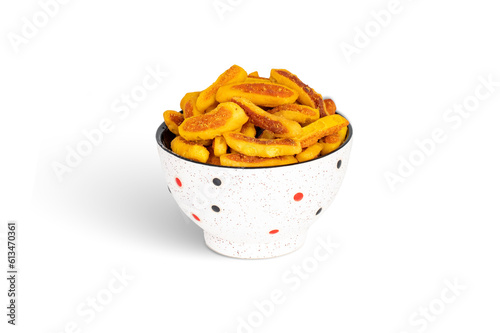 Fried Bhakarwadi Tea Time Snack isolated on white background photo