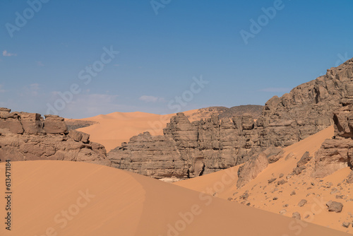 view in the Sahara desert of Tadrart rouge tassili najer in Djanet City   Algeria.colorful orange sand  rocky mountains