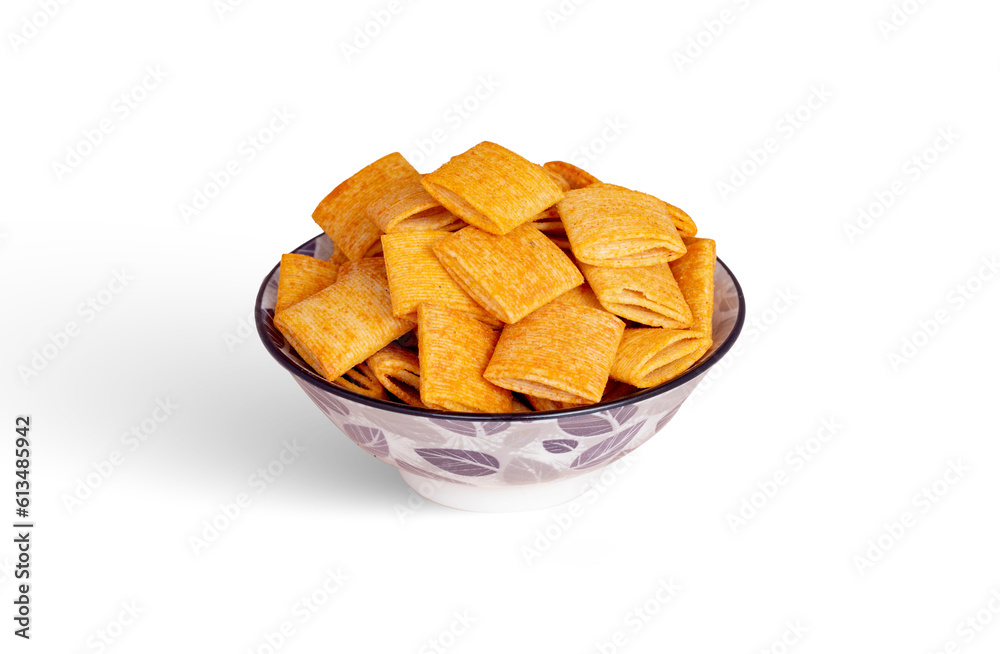 Corn snack in bowl isolated on light pink background. Corn snack in bowl isolated on light pink background.