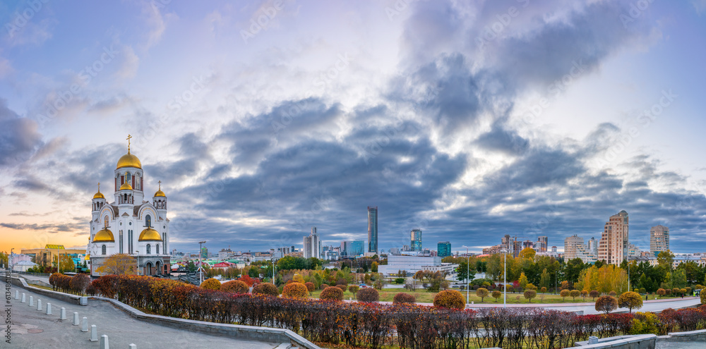 Obraz premium Temple in autumn in beautiful orange sunset light. Temple on Blood, Yekaterinburg, Russia