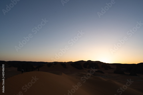 view in the Sahara desert of Tadrart rouge tassili najer in Djanet City   Algeria.colorful orange sand  rocky mountains