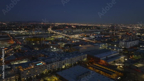 Wallpaper Mural Forwards fly above evening city. Illuminated 6th Street Viaduct glowing into night. Los Angeles, California, USA Torontodigital.ca