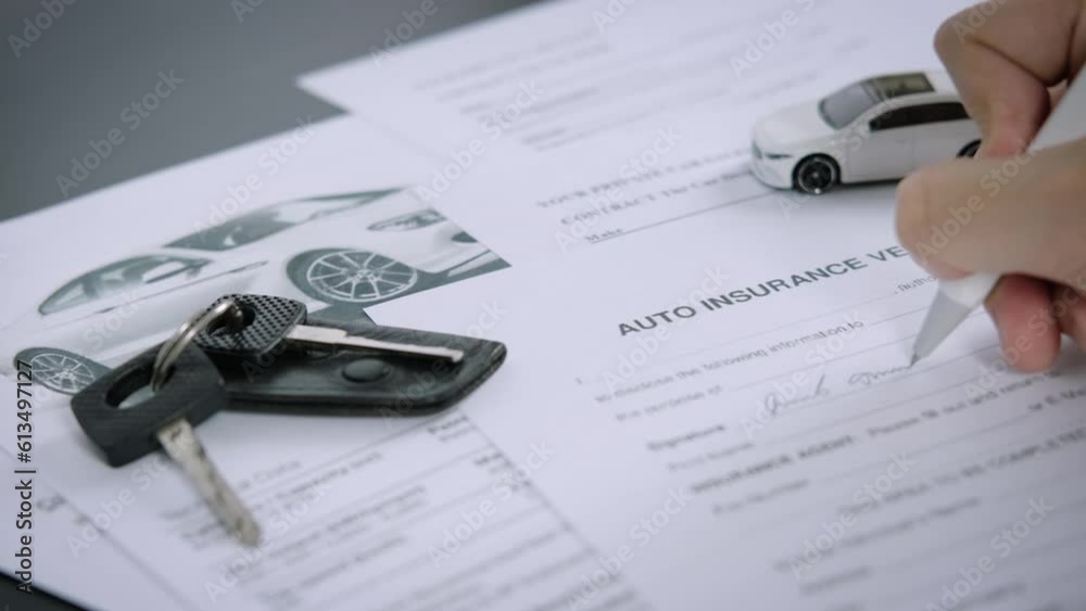Buyers or sellers who are reading car lease or car insurance contract and signing. Sale agent deal to agreement  car loan contract with customer and sign agreement contract, car Insurance concept.