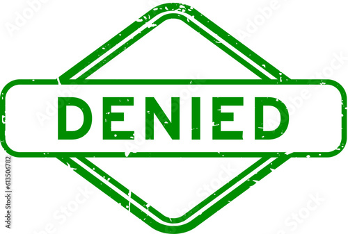 Grunge green denied word rubber seal stamp on white background photo