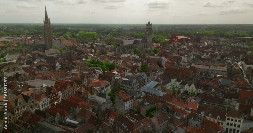 Aerial drone shot of Bruges is the beautiful medieval Historical City. Architecture and channels. Landmarks of Belgium architecture of Bruges. Aerial view. Establishing shot Aerial drone shot of Bruges is the beautiful medieval Historical City. Architecture and channels. Landmarks of Belgium architecture of Bruges. Aerial view. Establishing shot