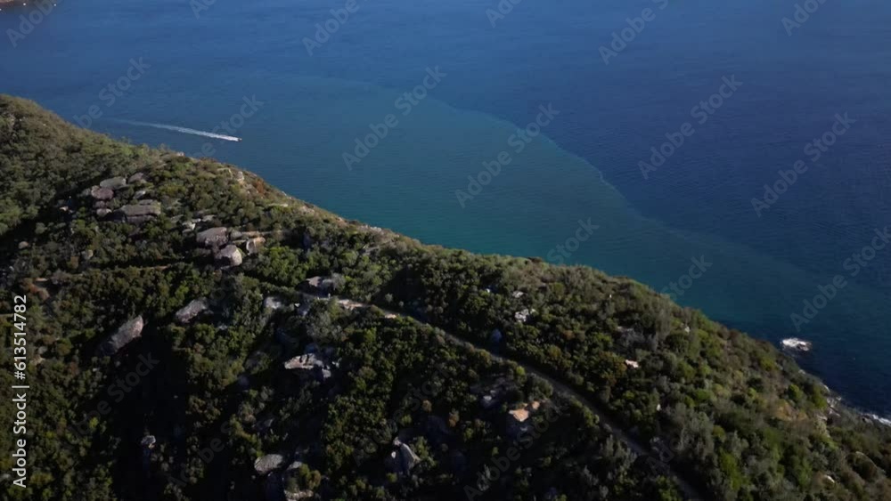 Aerial drone view of beautiful beach ocean with people playing and swimming with calm and peaceful ocean wave water Aerial drone view of beautiful beach ocean with people playing and swimming with calm and peaceful ocean wave water