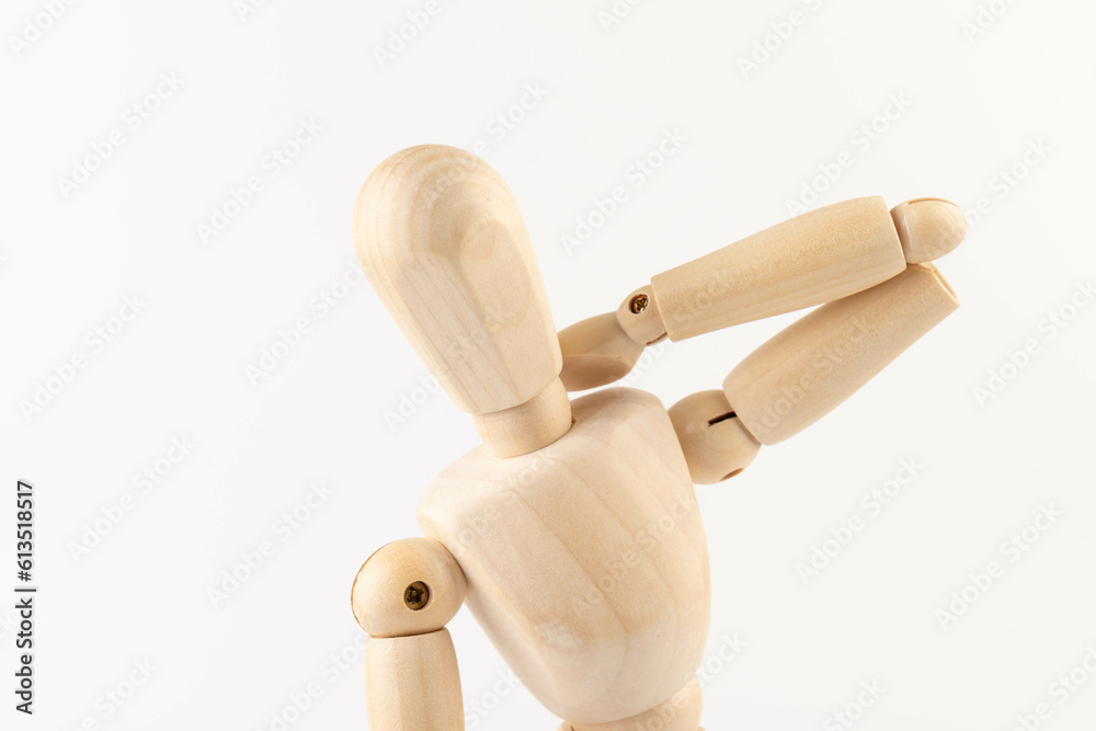 Wooden mannequin figure expressing neck pain. Wooden mannequin figure expressing neck pain.
