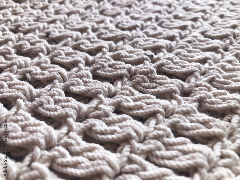 White knit wool texture background. White knit wool texture background.
