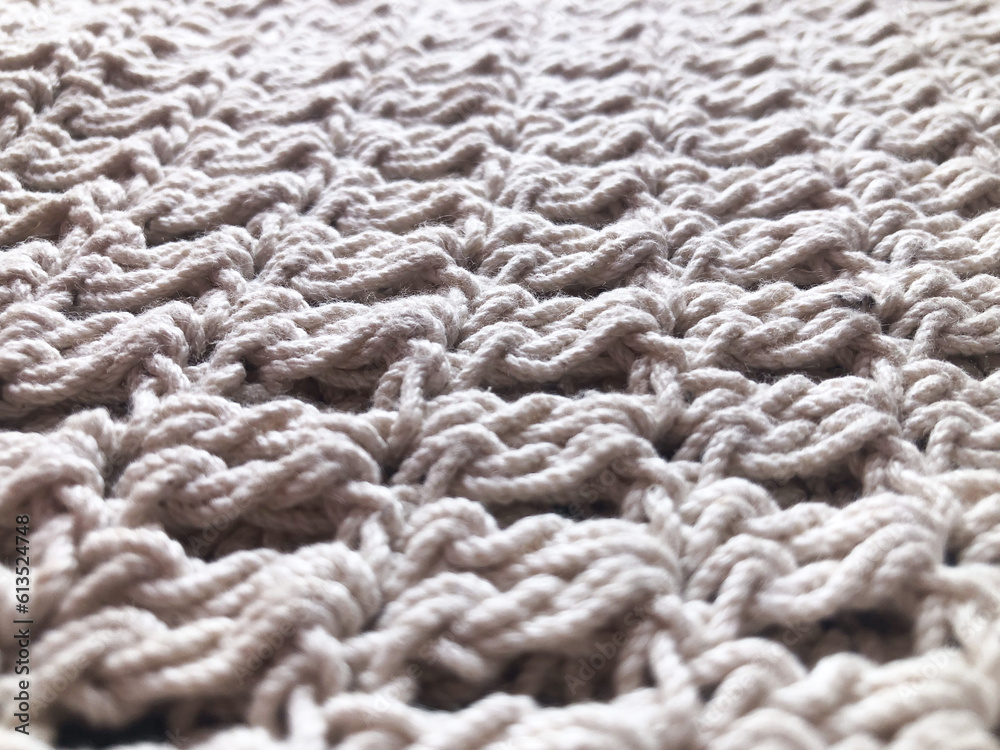 White knit wool texture background. White knit wool texture background.