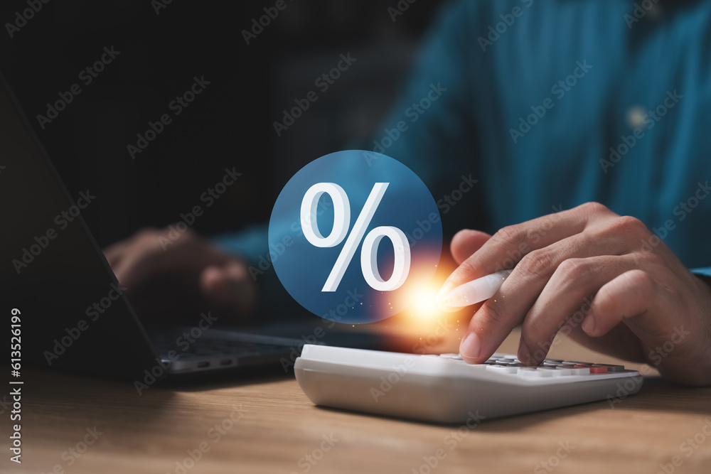 Interest rate and dividend concept, Investors are calculating profits and costs with calculators, return on stocks and mutual funds, long term investment for retirement, Long term business plan. Interest rate and dividend concept, Investors are calculating profits and costs with calculators, return on stocks and mutual funds, long term investment for retirement, Long term business plan.