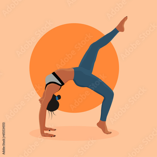 Dark-skinned girl does yoga on a mat