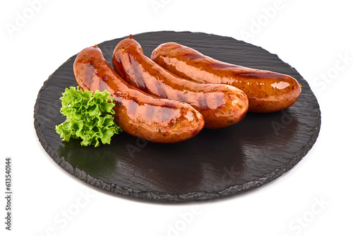 BBQ roasted pork sausages, isolated on white background.