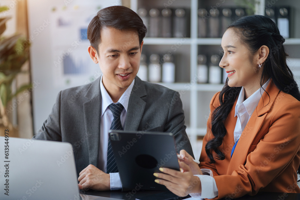 Asian business team discuss with new startup project Idea presentation, analyze planning and financial statistics and investment market at office. Asian business team discuss with new startup project Idea presentation, analyze planning and financial statistics and investment market at office.