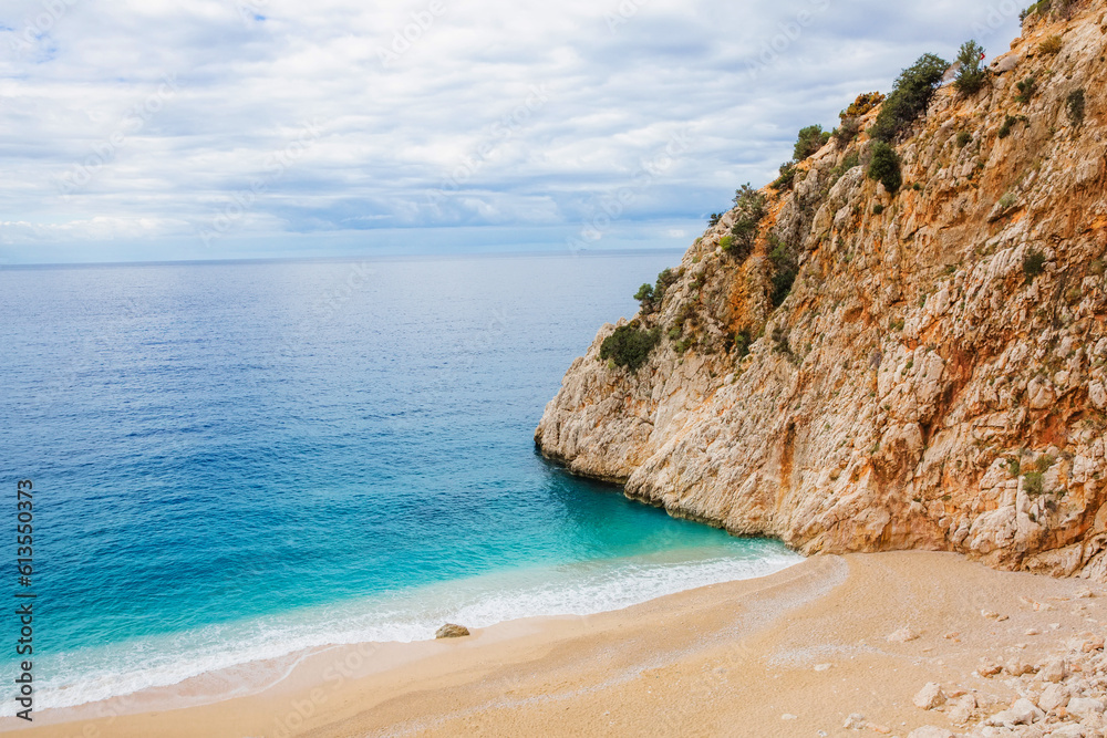 Beautiful bay with a beach and turquoise sea among big mountains. Kaputas beach, Kas, Türkiye.