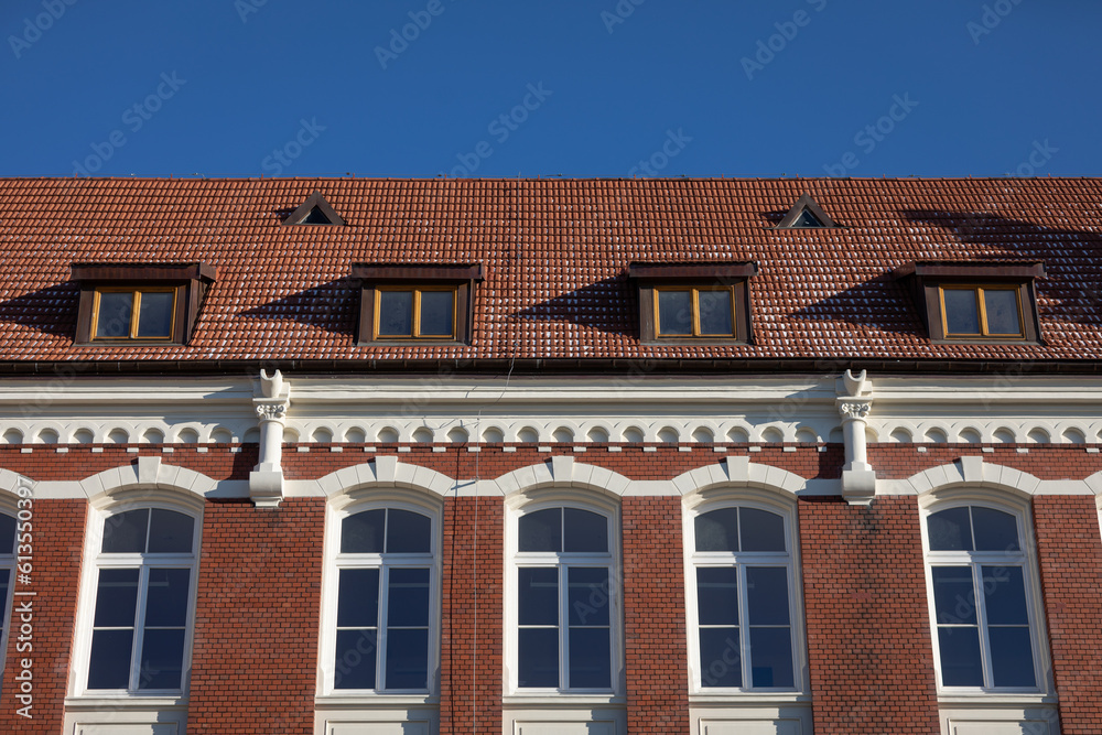 The curtain wall of a historic building maintained in the Neo-Gothic style. The curtain wall of a historic building maintained in the Neo-Gothic style.
