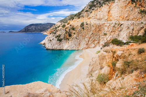 Beautiful bay with a beach and turquoise sea among big mountains. Kaputas beach, Kas, Türkiye. photo