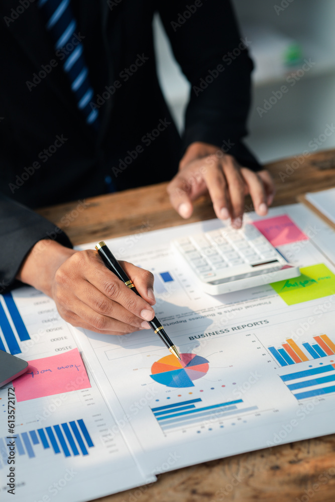 The sales department is having a monthly summary meeting to bring it to the department manager, they are verifying the correctness of the documents that are prepared before bringing in to the manager The sales department is having a monthly summary meeting to bring it to the department manager, they are verifying the correctness of the documents that are prepared before bringing in to the manager